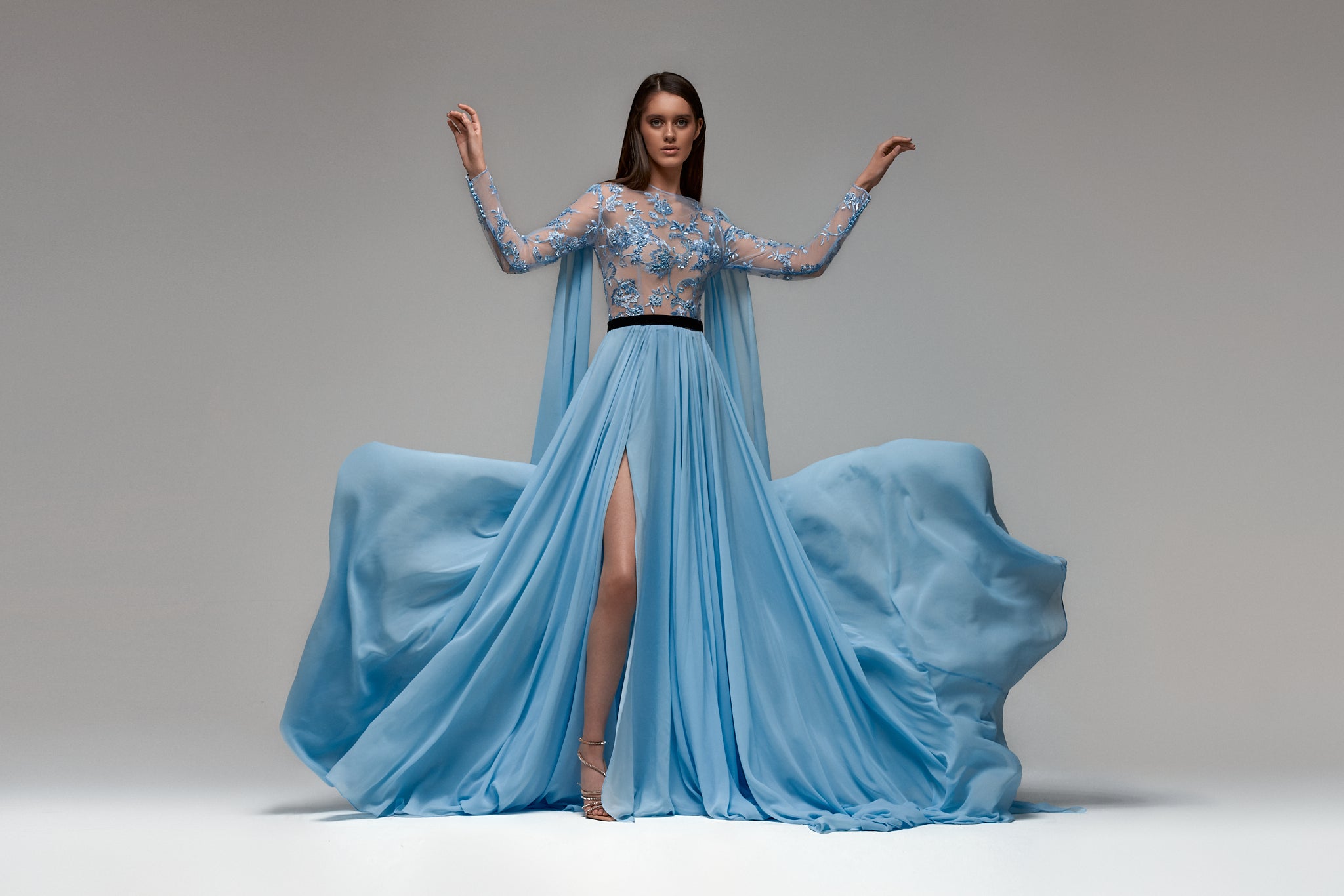 Model in blue couture dress made by Alyona Malai